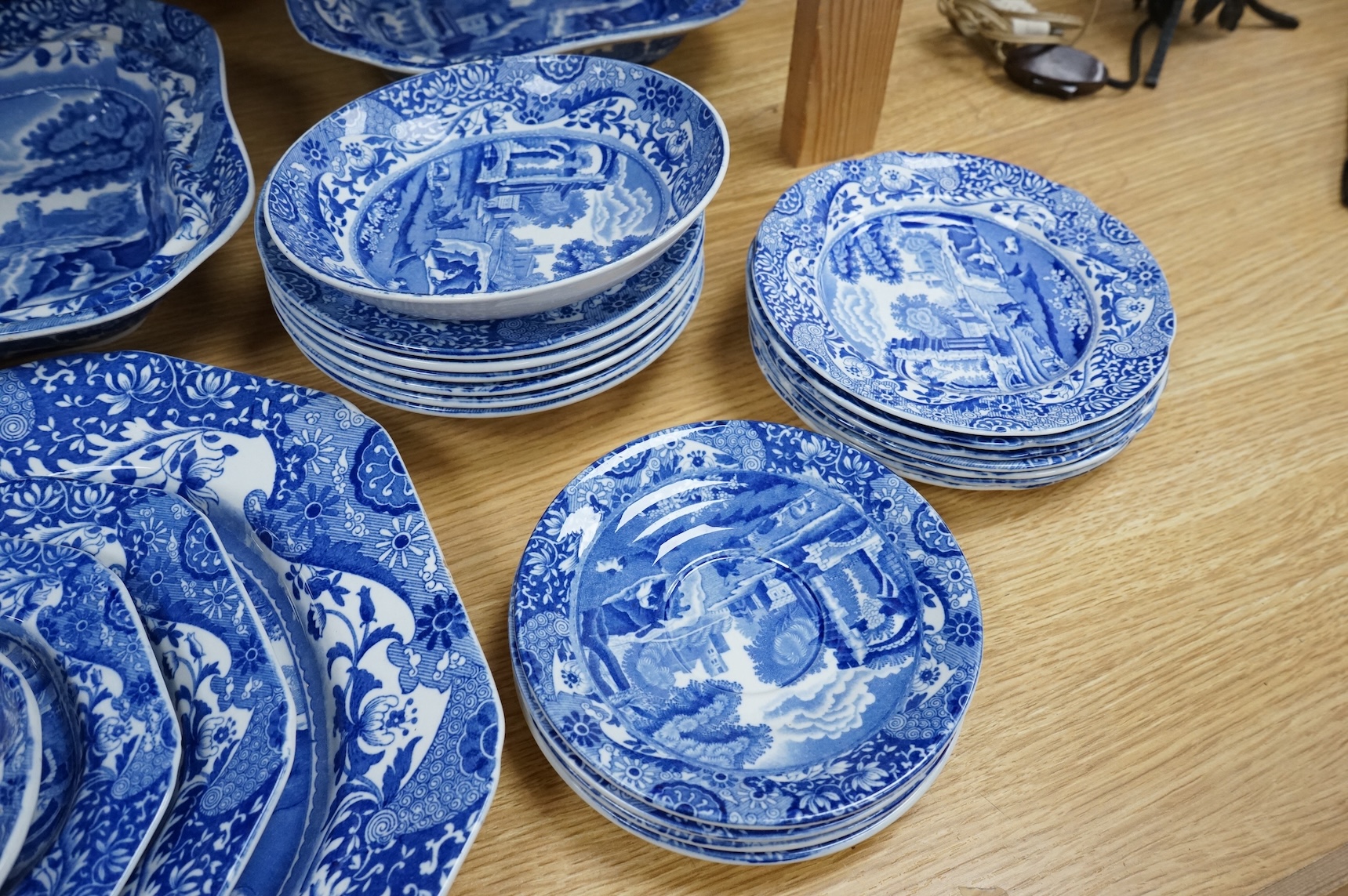 A Spode blue and white Italian service to include dinner plates, graduated bowls and platters, largest 37cm wide